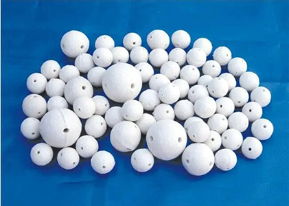 ceramic ball for catalyst bed protection in crackers